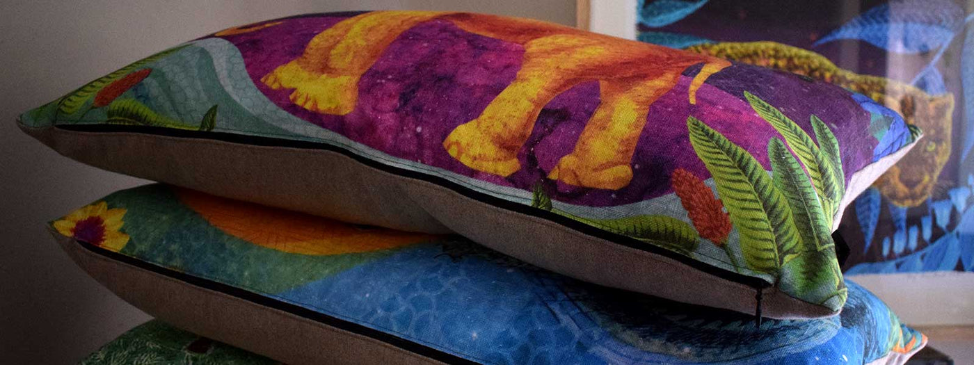Colourful pillows with African plants and animals